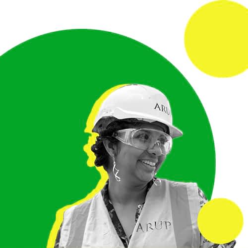 A smiling person wearing a safety helmet. The image is styled with a green and yellow background.