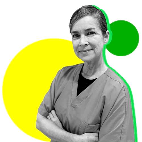 A nurse poses with a syringe on a yellow and green background.